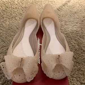 Ferragamo flats-  comfortable but narrow.  Really cute.